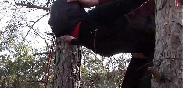  Tied up to a tree outdoor on sexy clothes, wearing pantyhose and high ankle boots heels, rough fuck
